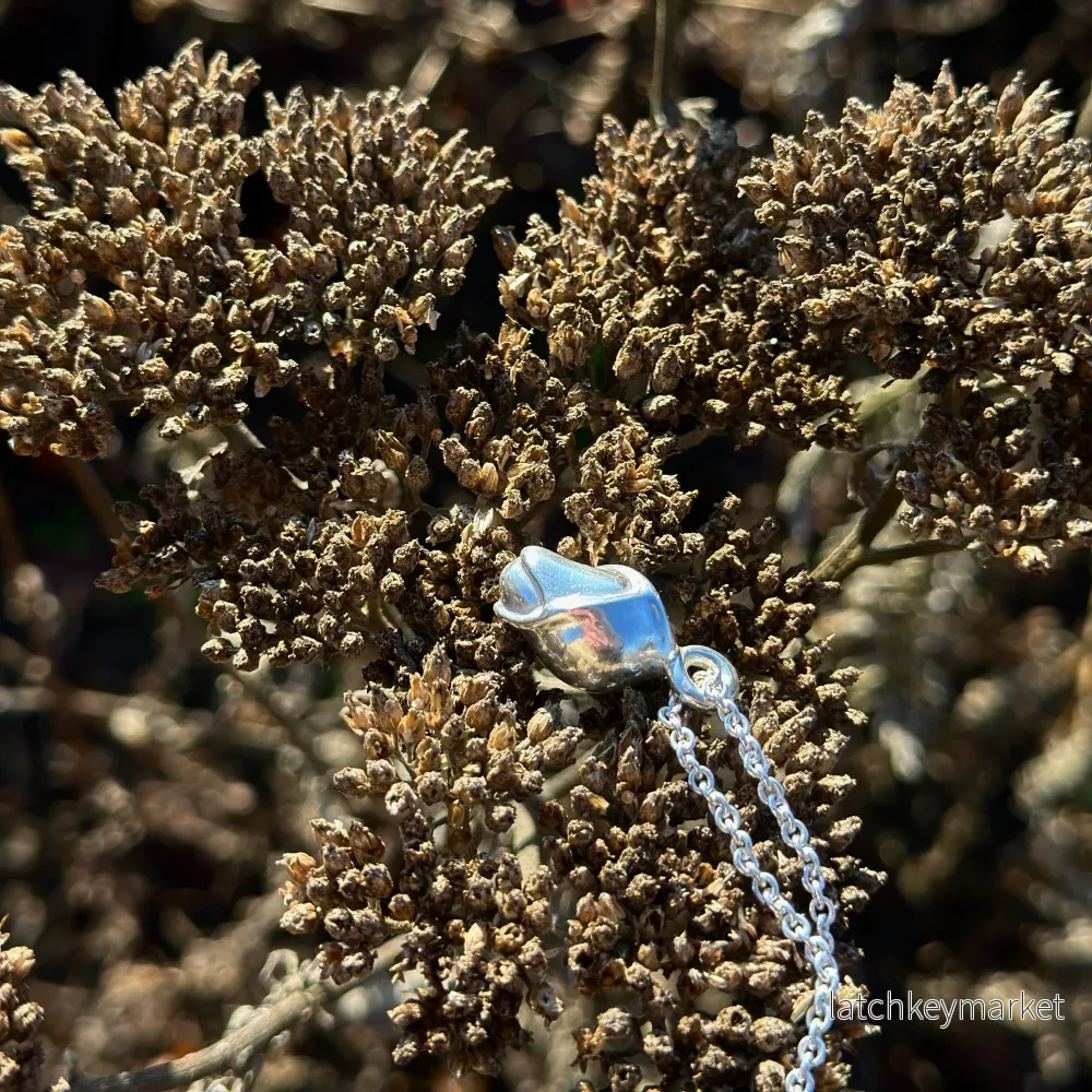 Halsband Knopp