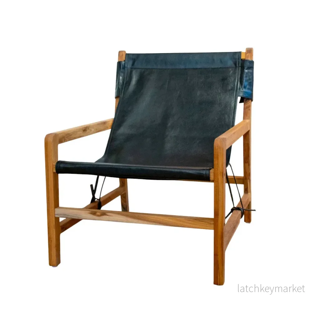 Fåtölj Jessie i teak och läder svart Fåtölj Jessie i teak och läder svart