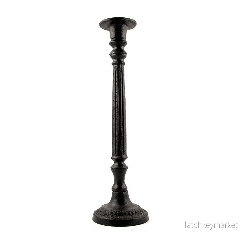 Ljusstake gjutjärn mellan Ljusstake gjutjärn mellan