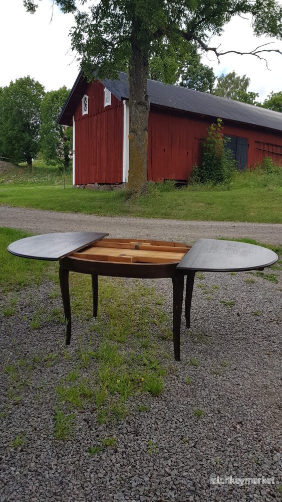 Ovalt matbord i mörkt trä med iläggsskivor - Bild 3