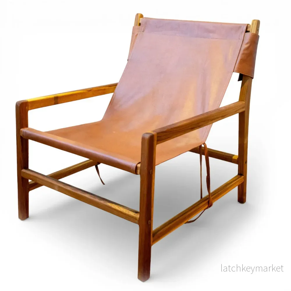 Fåtölj Jessie i teak och läder brun Fåtölj Jessie i teak och läder brun